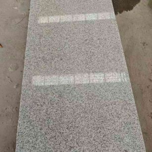 许昌芝麻白光面毛板